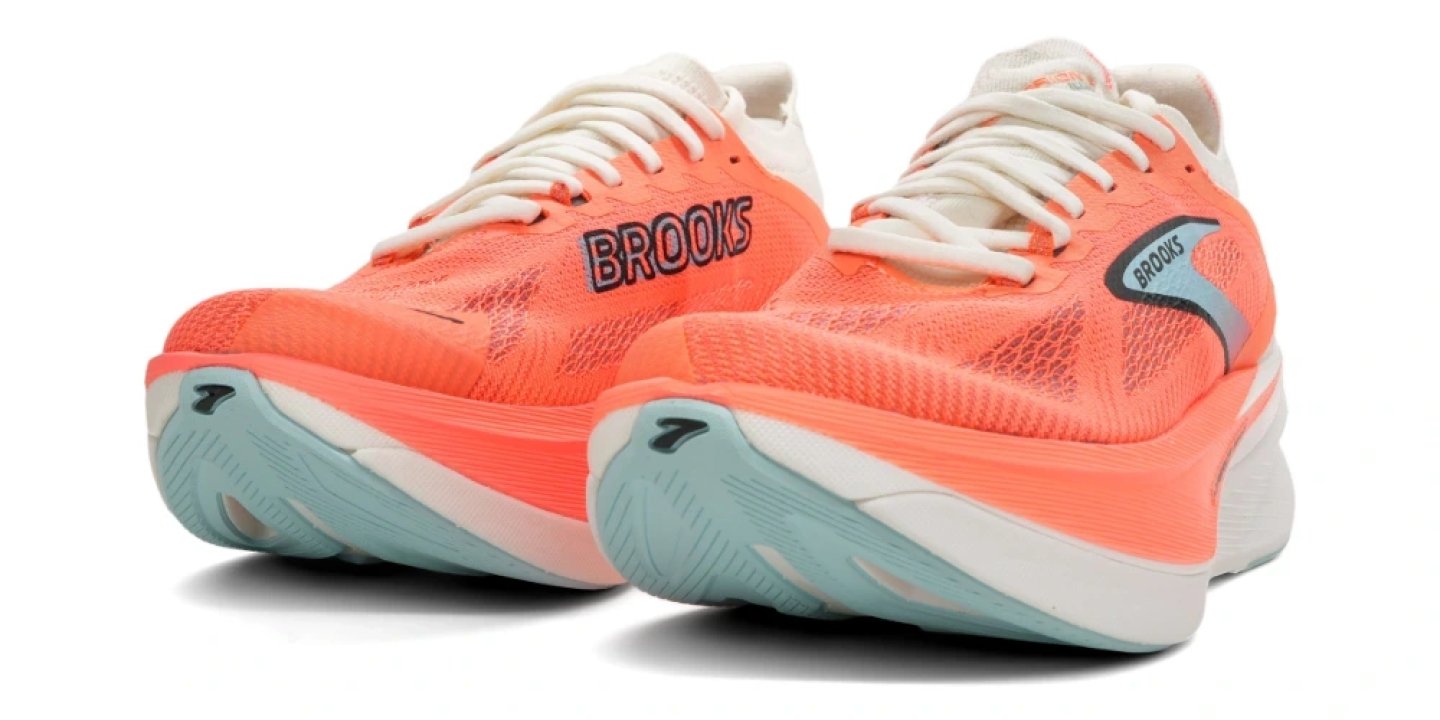 Brooks Hyperion Max 3 running shoes in coral orange and white with light blue outsole, rear three-quarter view