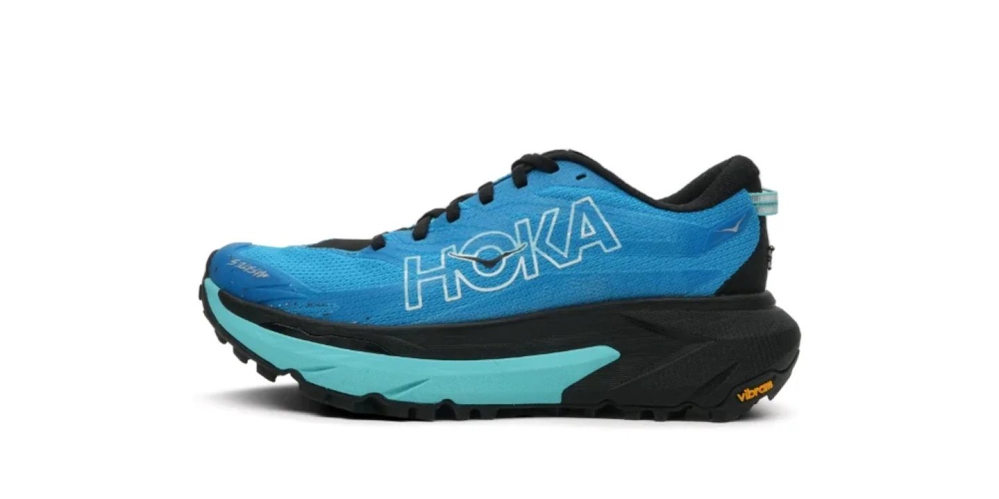 HOKA Mafate Speed trail running shoe in blue and aqua with black Vibram outsole, lateral side view.