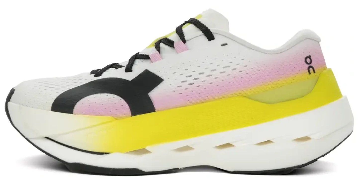 On Cloudboom Max running shoe in white with yellow midsole and pink gradient upper, lateral side view