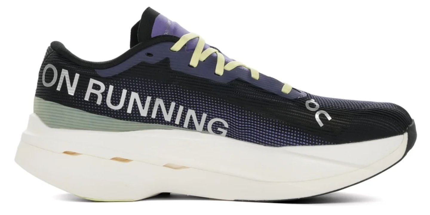 On Running performance shoe in black-to-purple gradient mesh with yellow laces and thick white cushioned midsole.