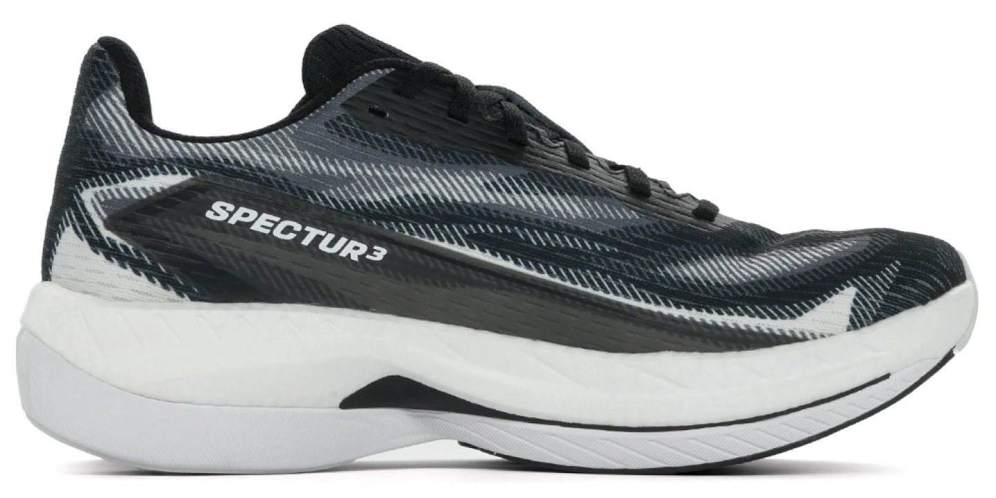 Salomon Spectur 3 Foam running shoe in black and white with geometric patterned upper and thick foam midsole, lateral view