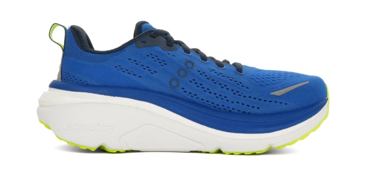 Saucony running shoe in royal blue mesh upper with white midsole and neon yellow outsole, lateral side view