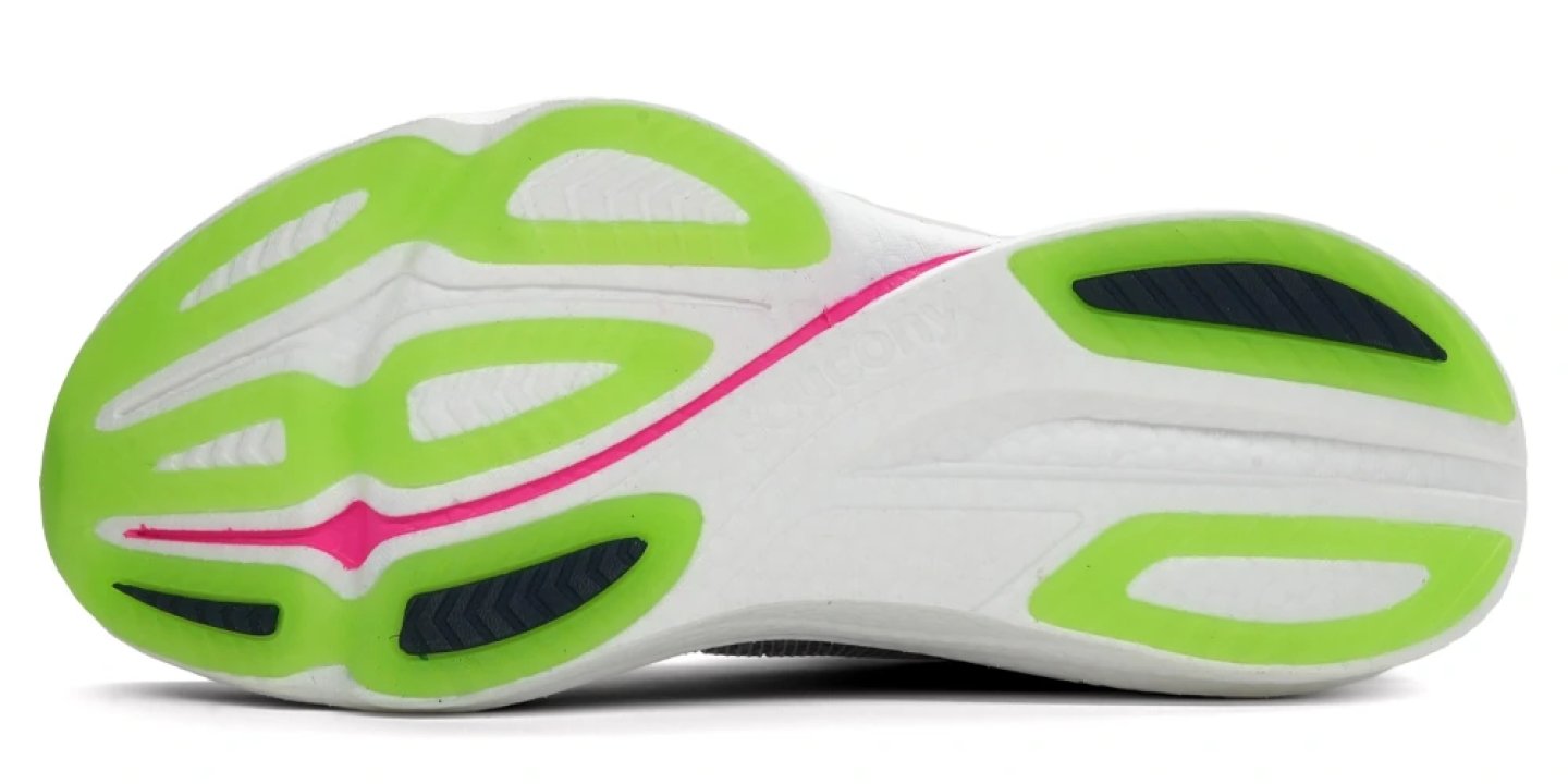 Bottom view of the Saucony Endorphin Azura running shoe outsole with lime green rubber pods and pink accent stripe