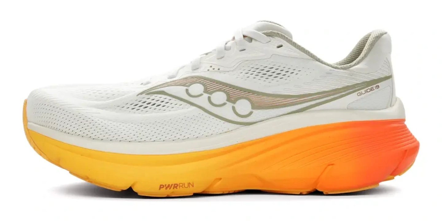 Saucony Guide 19 stability running shoe in white with gradient orange and yellow PWRRUN midsole, lateral view