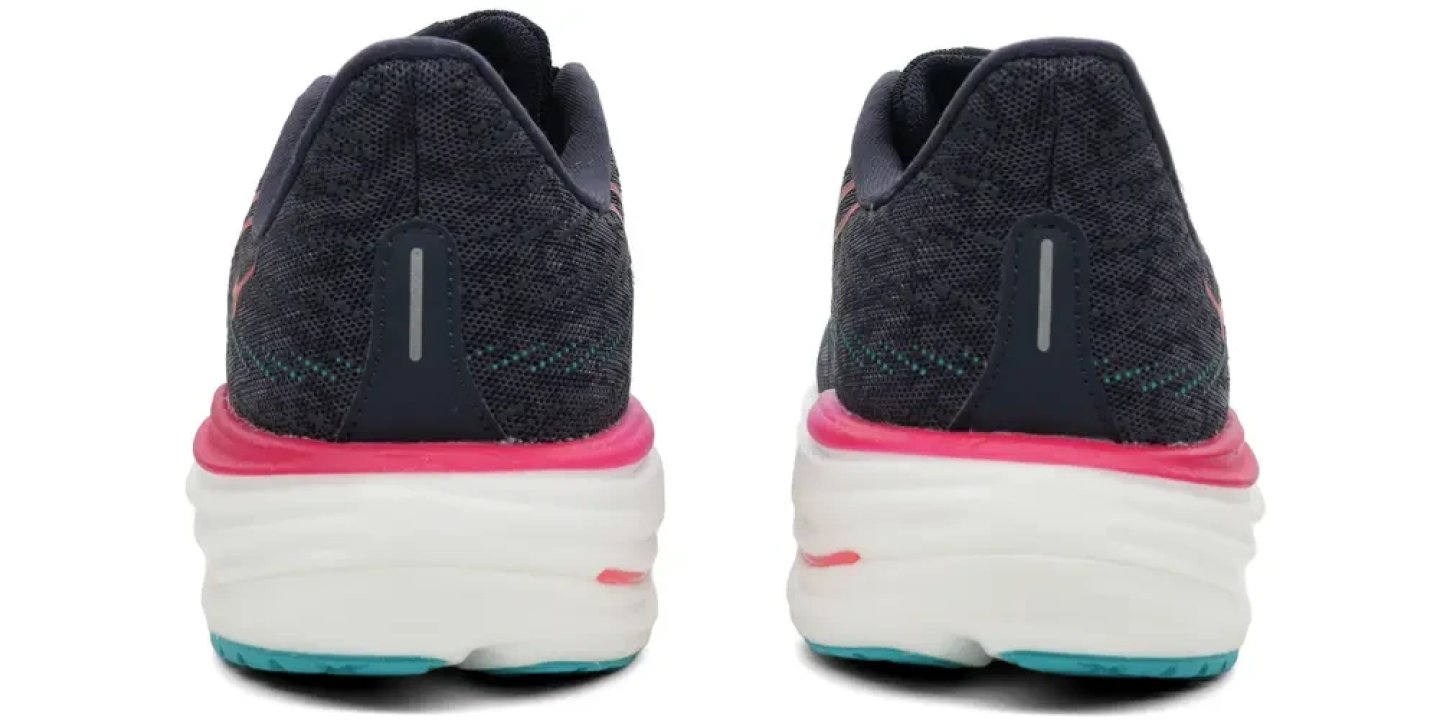 Rear view of Mizuno Wave Rider 29 women's running shoes in navy blue with pink and teal midsole accents