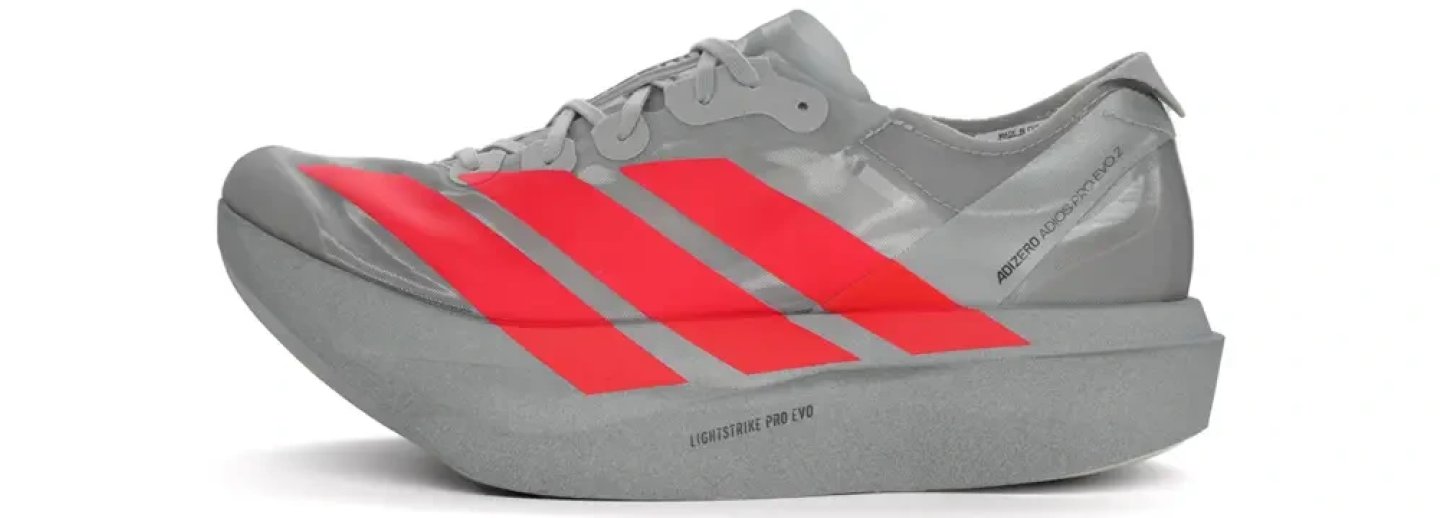 Adidas Adizero Adios Pro Evo 2 in grey and coral red, left side view showing Lightstrike Pro Evo midsole