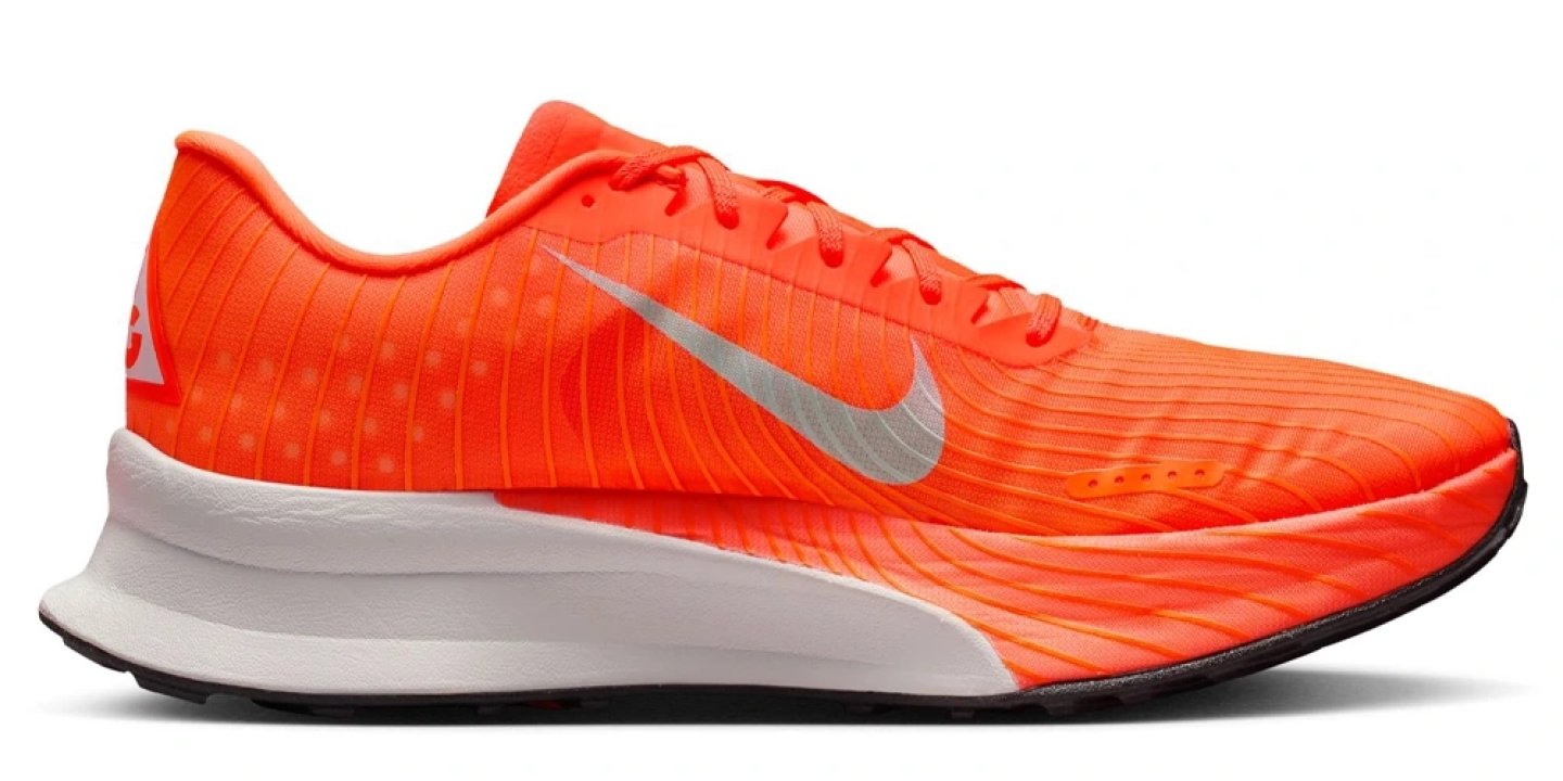 Nike ACG Ultrafly Trail Foam running shoe in Total Orange with silver Swoosh, white midsole and black outsole, lateral view